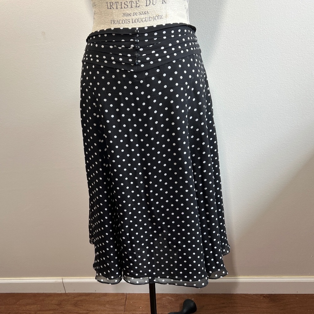 Black polka dots tulip shape skirt with beautiful details